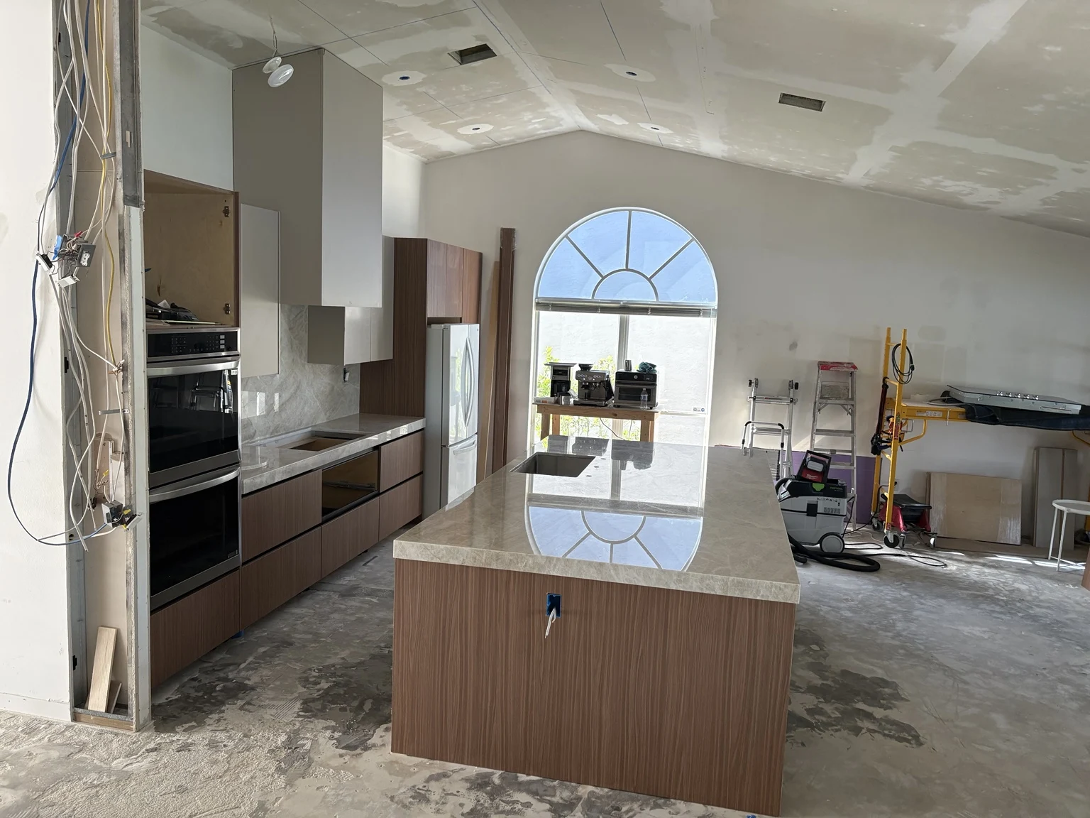 Kitchen cabinets and island during renovation